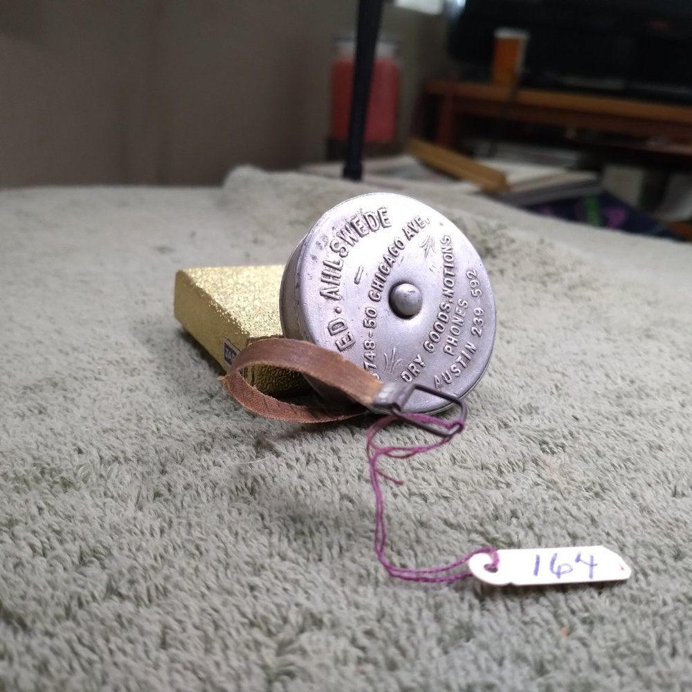 Vintage tape measure ahlswede dry goods souvenir Austin Texas